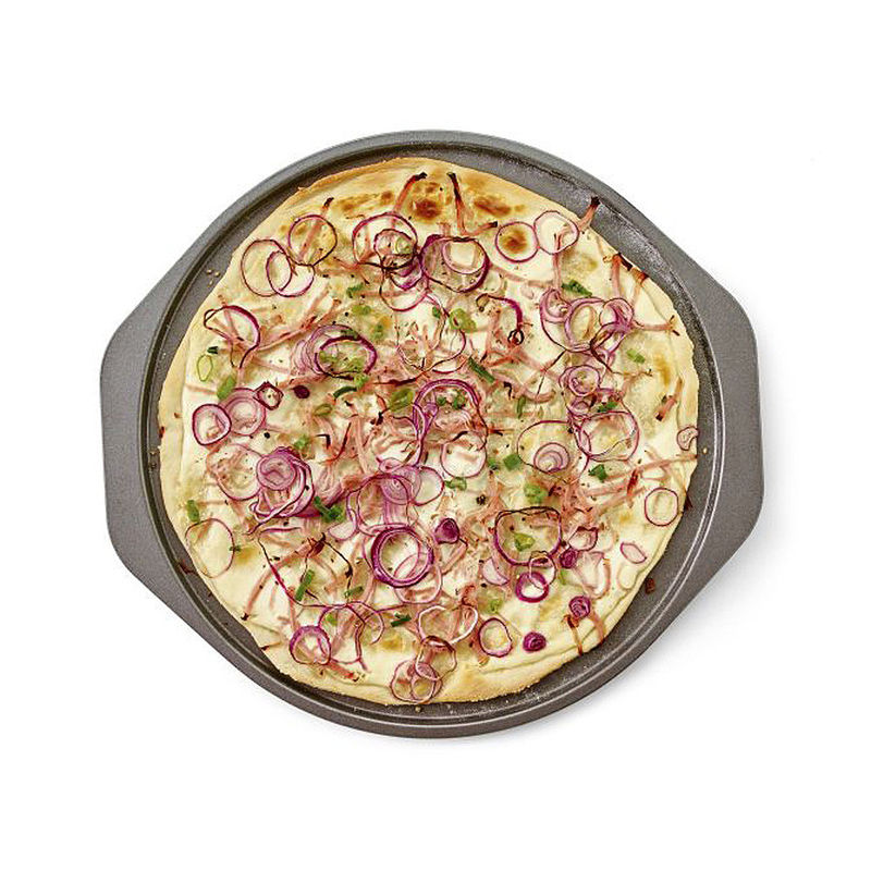 Des fonds de pizzas super croustillants réussis sur une plaque parfaitement perforée Photo 2