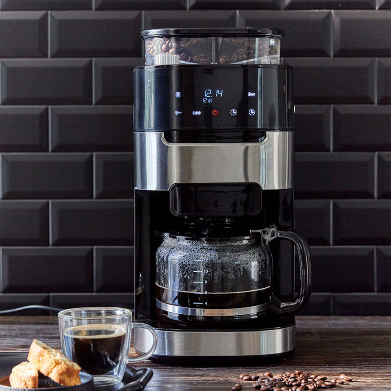 Parfaite, la machine à café entièrement automatique, avec broyeur conique et minuterie Photo 4