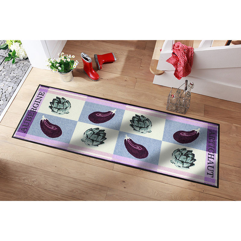 Ce tapis de sol spécial cuisine au design exclusif au motif aubergine protège sols et articulations