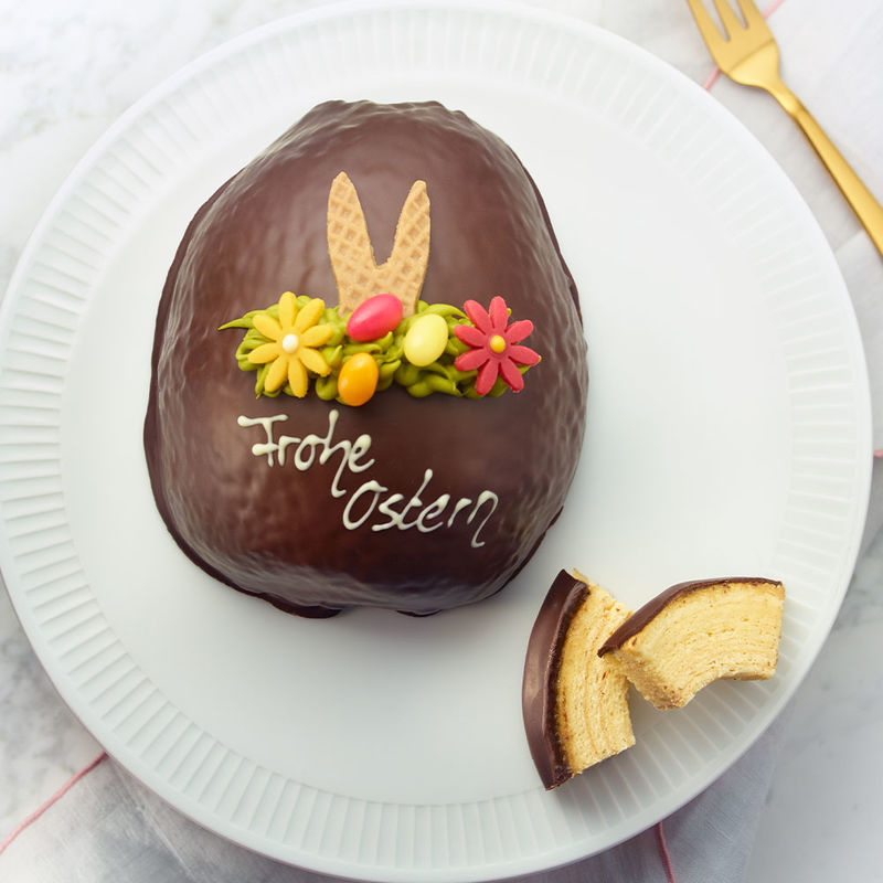Frohe Ostern: Dekoratives Baumkuchen-Osterei