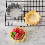 Image du produit pour 'Moules � tartelettes ronds � fond amovible : d�moulez facilement les p�tes les plus fragiles'